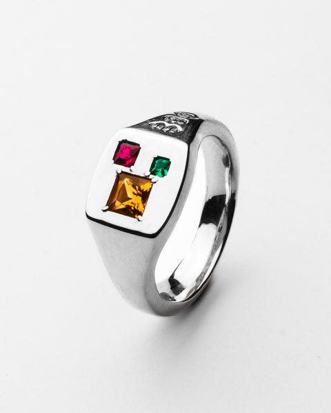 Gem Signet in sterling silver — angled front view of three flush-set coloured gemstones