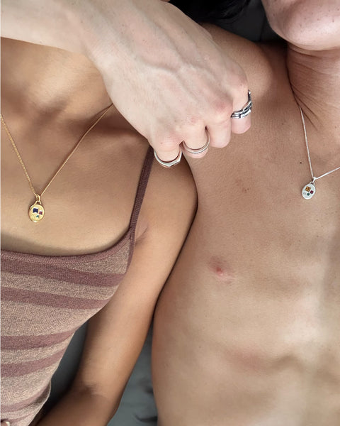Three Stone Pendant in 24ct gold plate — worn beside the sterling silver version
