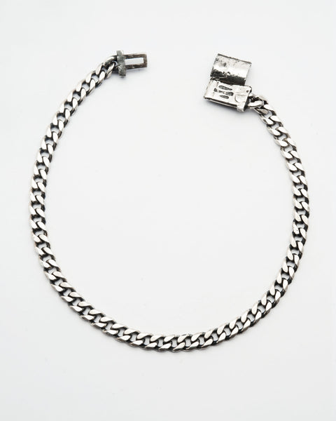 Lou's Cuban in sterling silver — full open bracelet showing Cuban links and box clasp