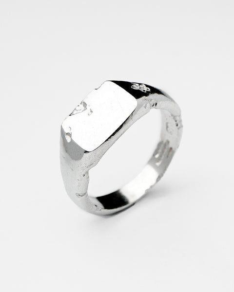 Cliffside Signet in sterling silver — angled view of the rectangular face and textured band