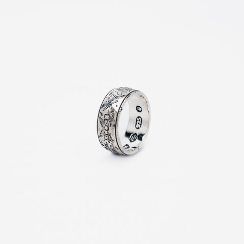 The Grad Ring in sterling silver — upright right-side view with the 925 hallmark visible
