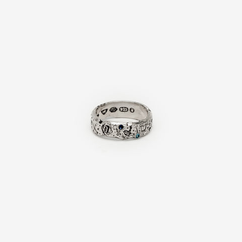 Lou's Grad Ring in sterling silver — horizontal front view showing two blue gemstones