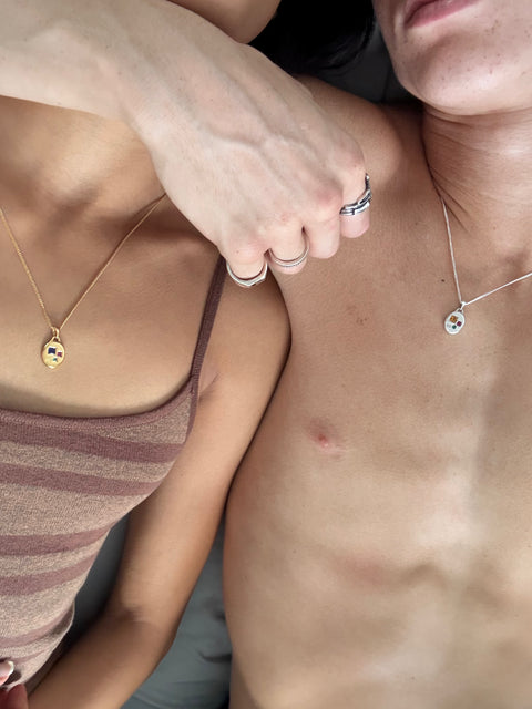Three Stone Pendant in sterling silver — worn beside the gold version