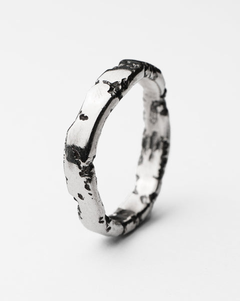 Lou's Stacker in sterling silver — angled view of the hand-shaped band