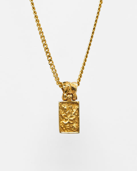 Nascence Pendant in 24ct gold plate — front view of the frangipani engraving on chain