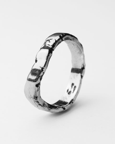 Serene II ring in sterling silver — angled view of the wide organic band