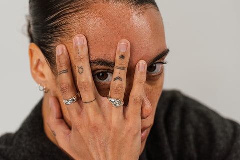 Return Signet in sterling silver — worn on hand in a portrait view